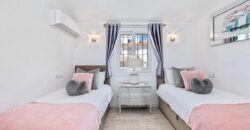Elegant 2 bedroom apartment with private patio & Rooftop terrace.