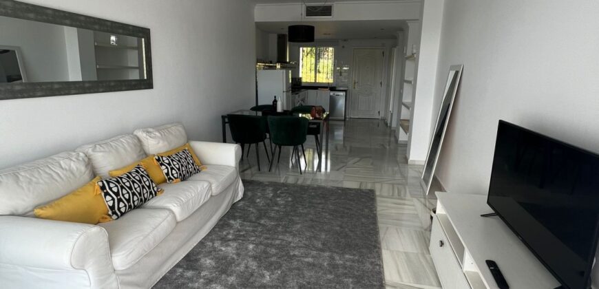 2 bed apartment with a large terrace and stunning views in Nueva Andsalucia