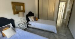 2 bed apartment with a large terrace and stunning views in Nueva Andsalucia